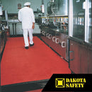 Firmagrip red safety matting in food production facility, showing chemical-resistant surface for wet processing areas